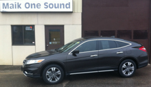 Black 2013 Honda Crosstour with dark privacy window tint